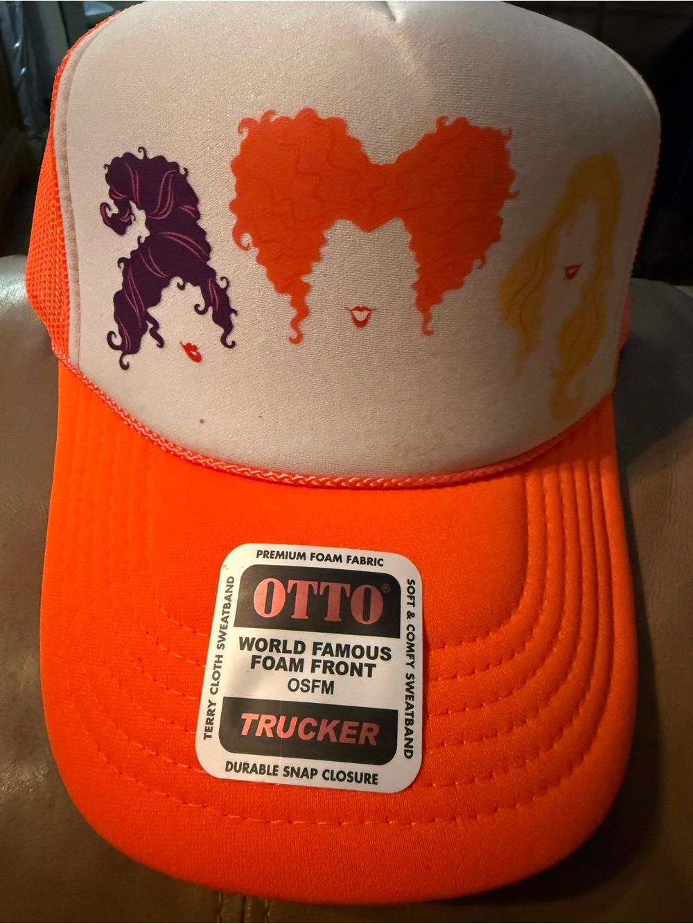 Hocus Pocus OTTO Bright Orange Trucker Hat with Multicolor Hair Silhouettes